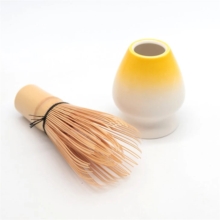 Detentur tal-Whisk tat-te gradjent isfar abjad ESTICK